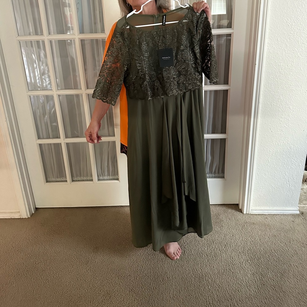 Olive green dress with lace sleeves and pockets!
